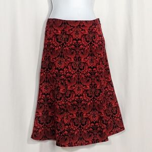 SOLD 2000s whimsigoth flared midi skirt